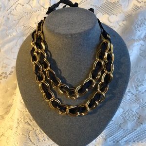 Black ribbon, yellow gold-plated chain necklace